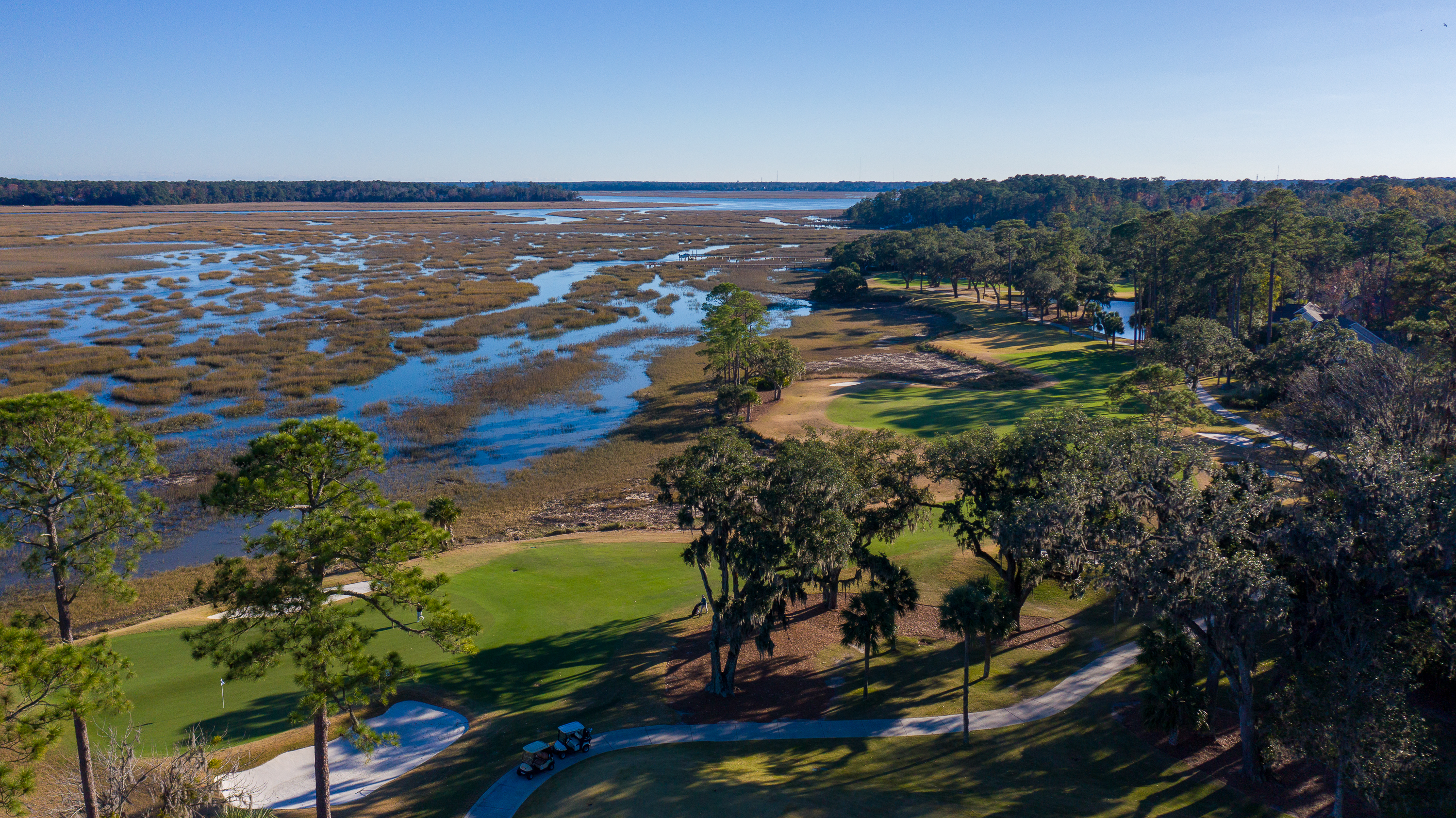 4BR Bluffton Park home with lagoon views, deck, porch & walkable Old Town location.